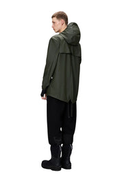 Unisex Rains fishtail waterproof jacket with a sleek trench design, featuring a high collar and adjustable waist for a stylish look.
