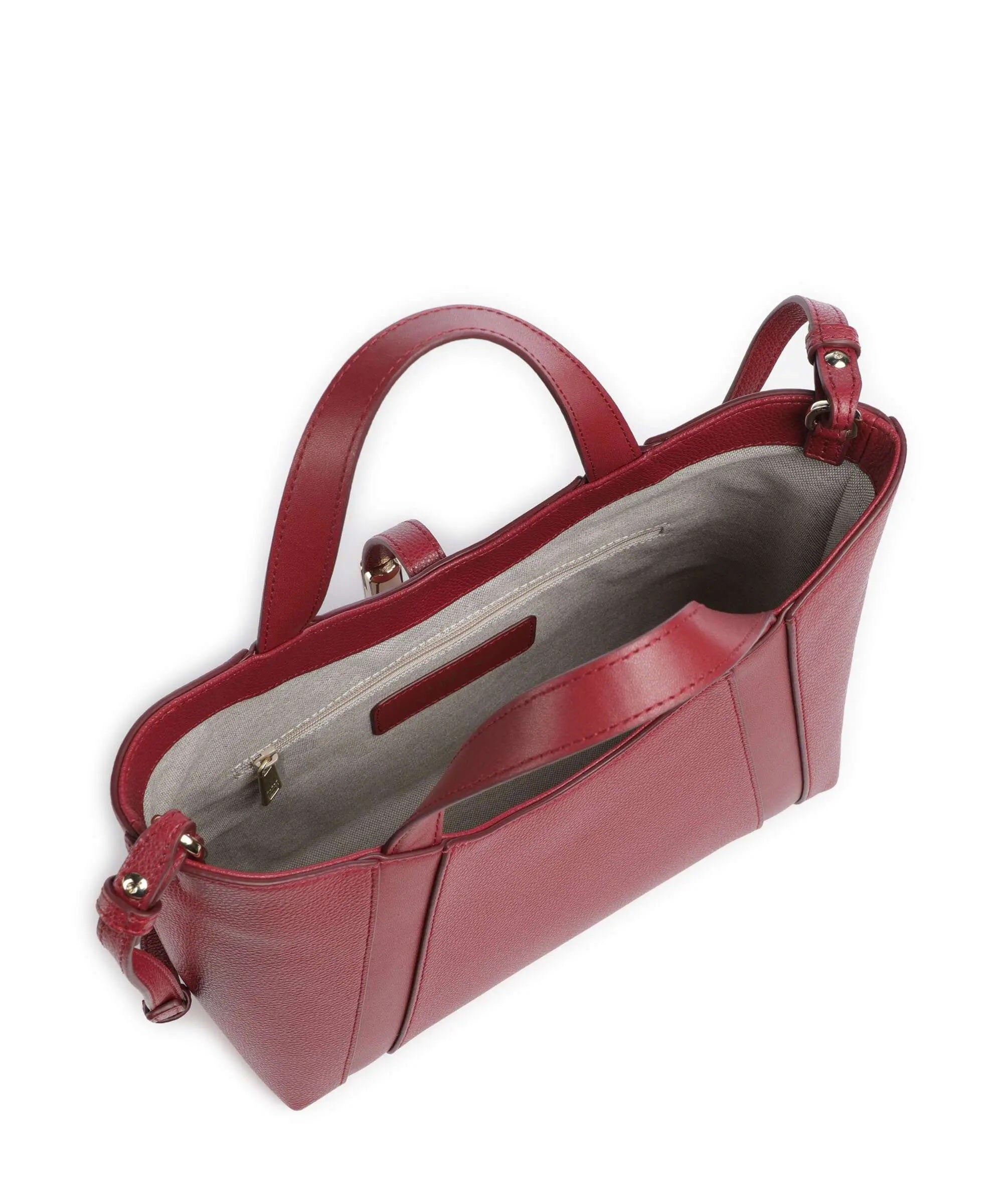 Furla Goccia S tote bag with fur accents, stylish leather handbag for women, featuring a sleek design and top handles.