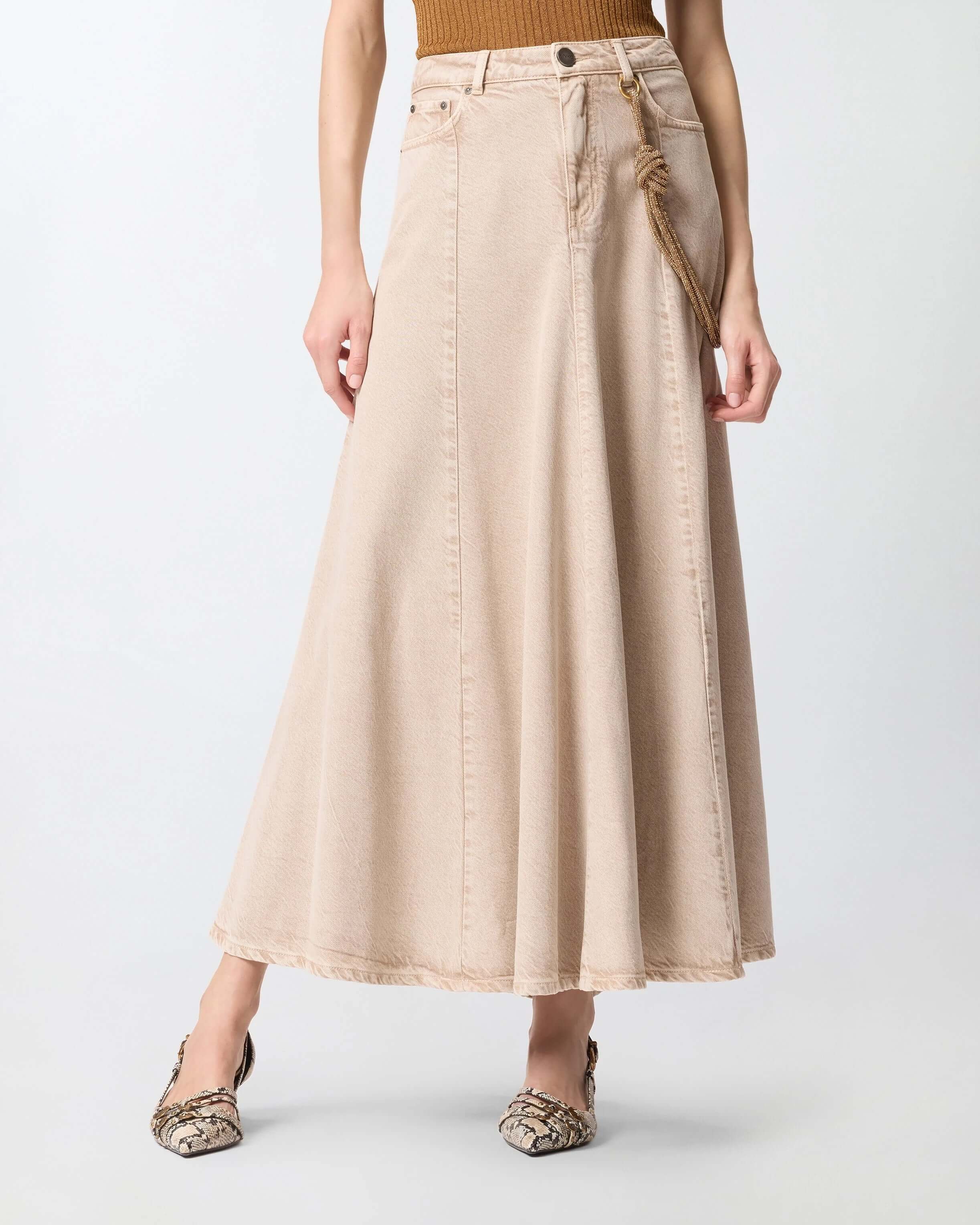 Pinko Hurghada Gonna Donna in pink fabric with a flowing design and detailed stitching, displayed on a hanger.