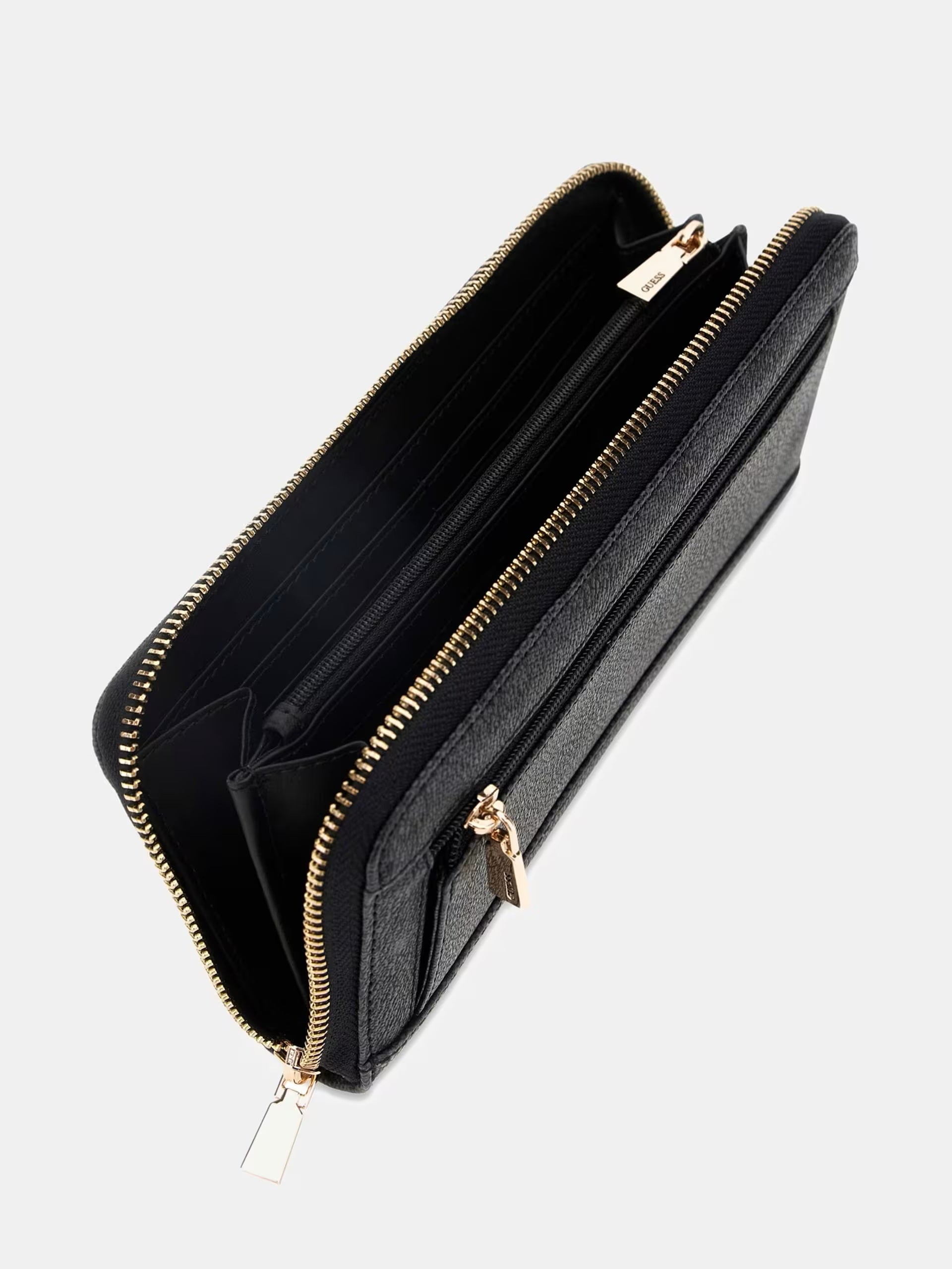 Large zip-around wallet in black leather by Guess, featuring multiple card slots and a stylish logo design.