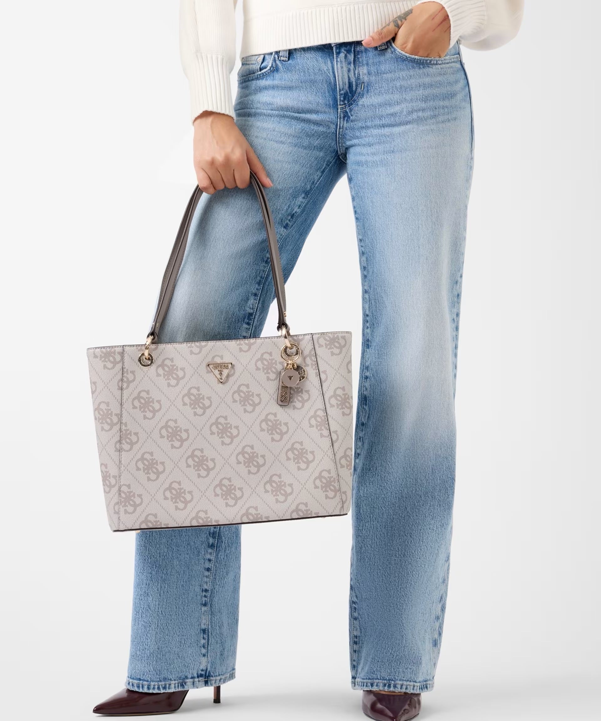 Noelle II Tote by Guess, a stylish women's shopping bag with a sleek design and spacious interior.