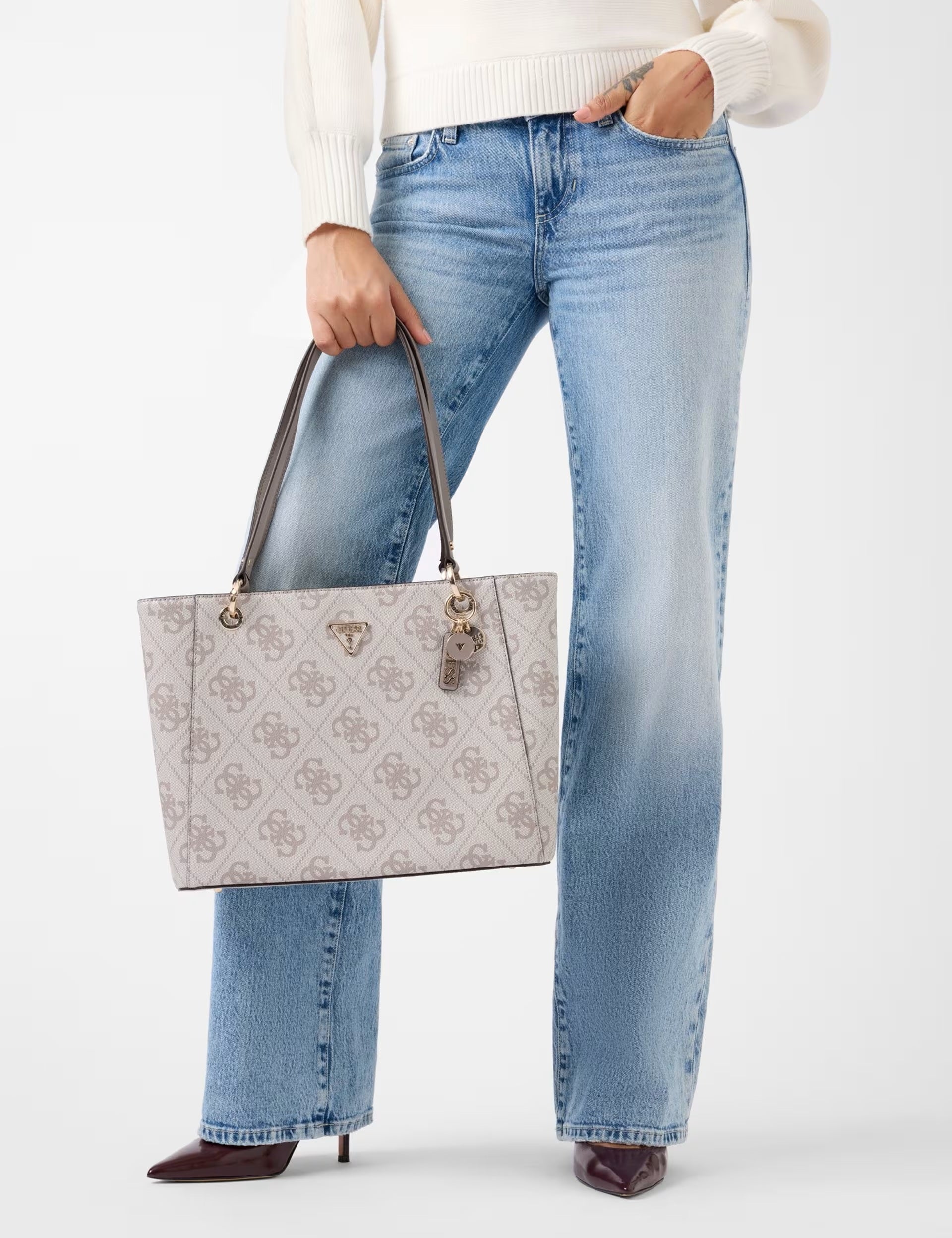 Noelle II Tote by Guess, a stylish women's shopping bag with a sleek design and spacious interior.