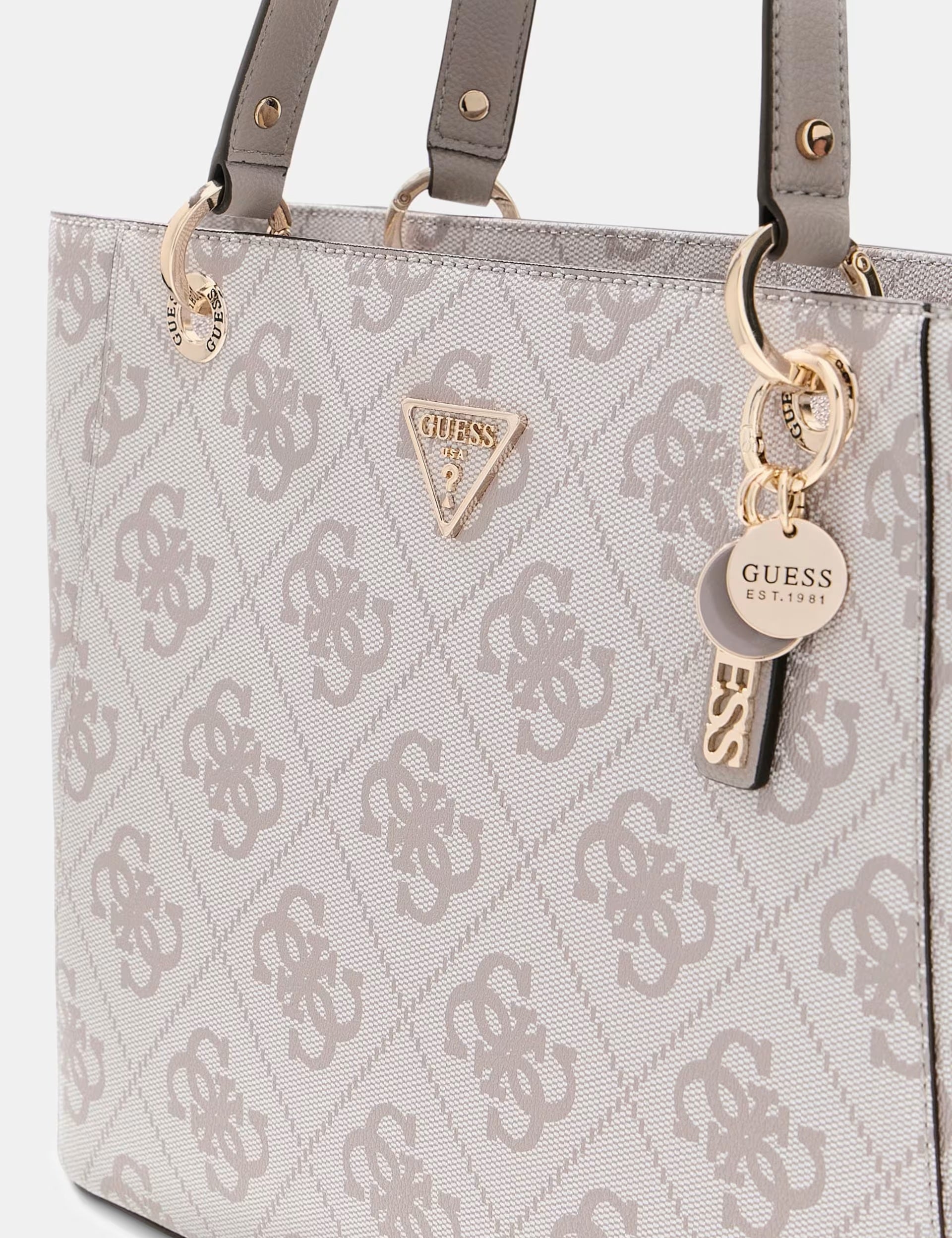 Guess Noelle II Tote in a stylish design, featuring spacious interior and elegant handles for everyday shopping use.