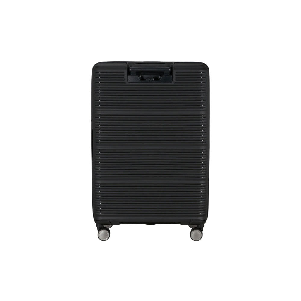 Large Samsonite Paralux trolley in black with sturdy wheels and extendable handle, designed for unisex travel and easy packing.