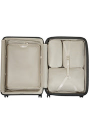 Large Samsonite Paralux Trolley Exp with sturdy handle and four wheels, designed for unisex travel and large luggage needs.