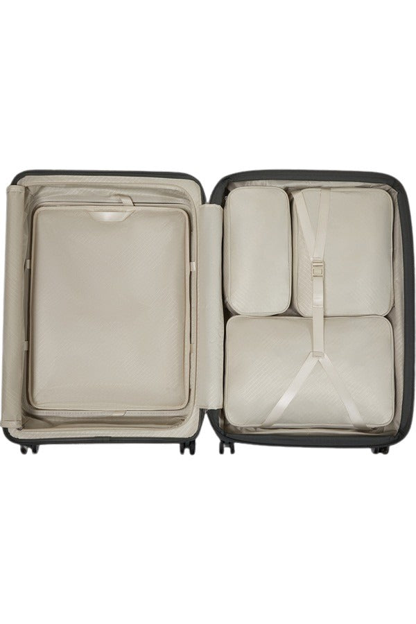 Large Samsonite Paralux Trolley Exp with sturdy handle and four wheels, designed for unisex travel and large luggage needs.
