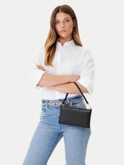 Michael Kors Jet Set Pochette for women, stylish accessory with signature logo, perfect for carrying essentials.