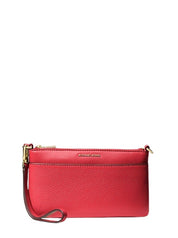 Michael Kors Jet Set pochette for women, stylish accessory with logo details, perfect for carrying essentials.