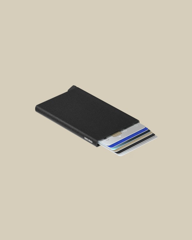 Secrid Porta Carte Cardprotector unisex wallet with compact design, holding credit cards and IDs, made of sleek metal material.