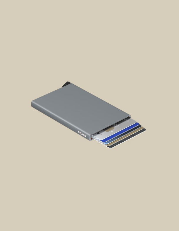 Secrid Porta Carte Cardprotector unisex wallet with compact design and metal finish for storing credit cards and IDs.