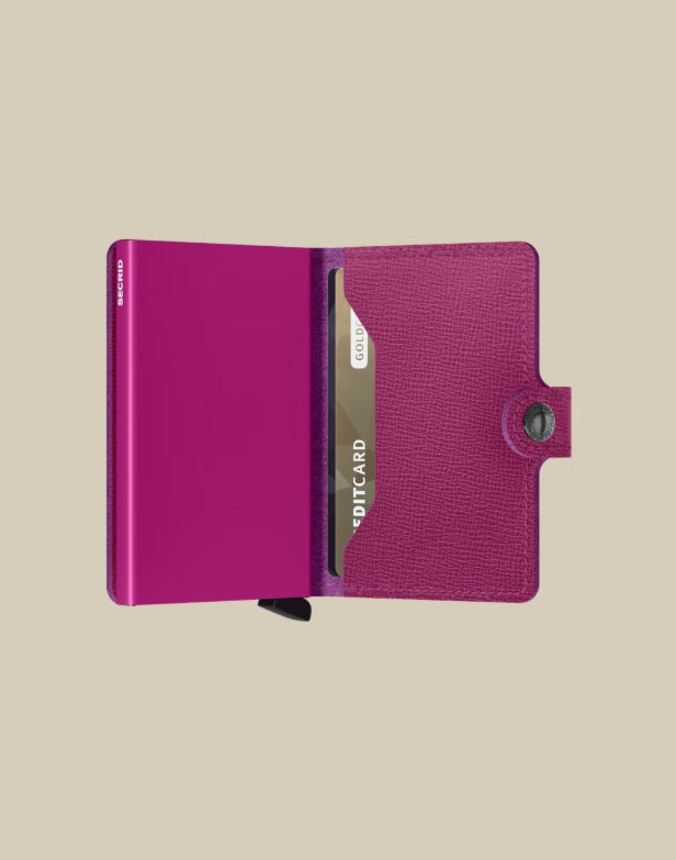 Secrid Miniwallet Crisple Secrid in vibrant green with textured surface, unisex card holder and document organizer.