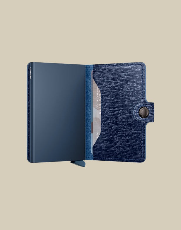 Secrid Miniwallet Crisple Secrid in textured leather, unisex card holder with multiple card slots and compact design.