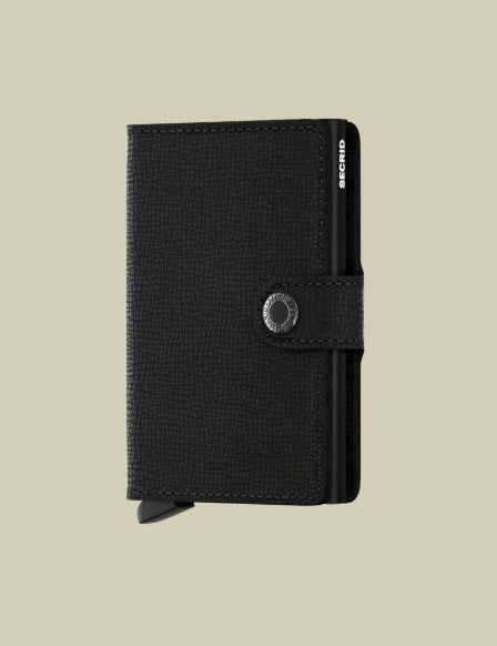 Secrid Miniwallet Crisple Secrid unisex card holder with textured design, compact leather accessory for credit cards and documents.