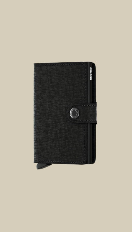 Secrid Miniwallet Crisple Secrid unisex card holder with textured design, compact leather accessory for credit cards and documents.