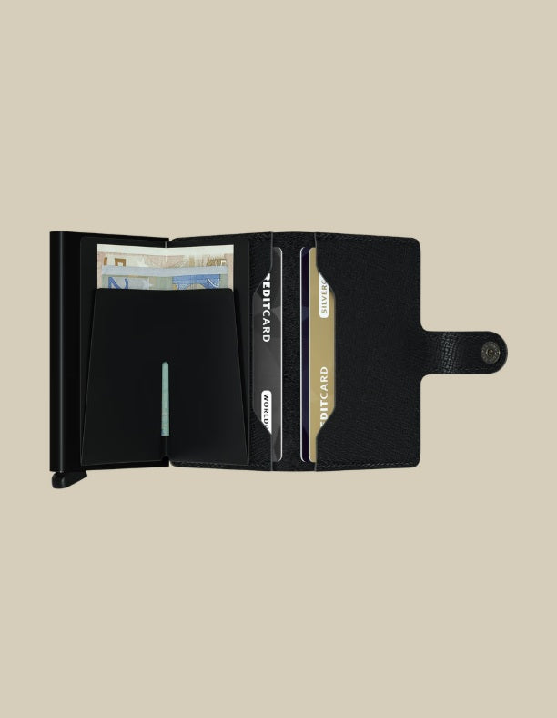 Secrid Miniwallet Crisple Secrid unisex card holder with textured design, compact accessory for credit cards and IDs.