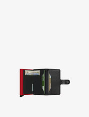 Secrid Porta Carte Miniwallet Cubic unisex leather card holder with compact design and secure card storage.