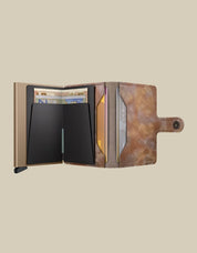 Secrid Miniwallet Jungle Porta Carte unisex, compact leather wallet with jungle print, for cards and small documents.