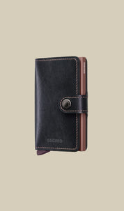 Secrid Miniwallet Porta carte in MIRUM plant-based leather, unisex accessory with card and document slots.