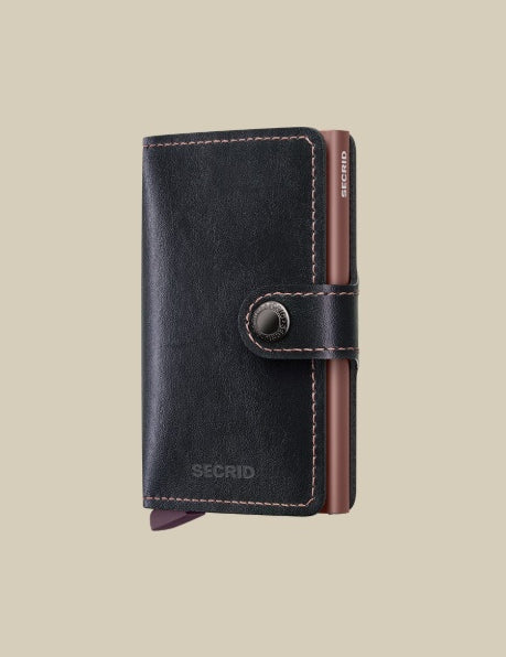 Secrid Miniwallet Porta carte in MIRUM plant-based leather, unisex accessory with card and document slots.