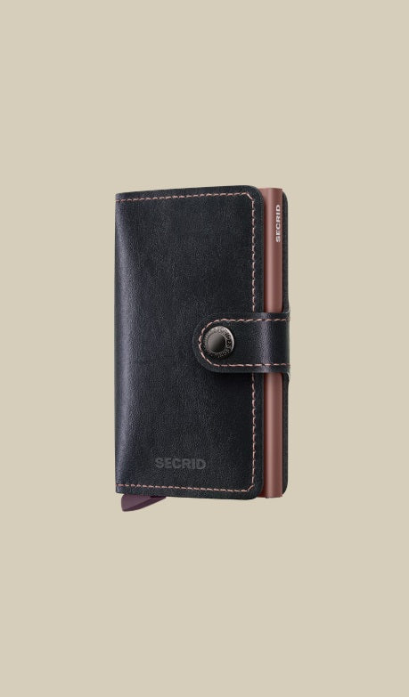 Secrid Miniwallet Porta carte in MIRUM plant-based leather, unisex accessory with card and document slots.
