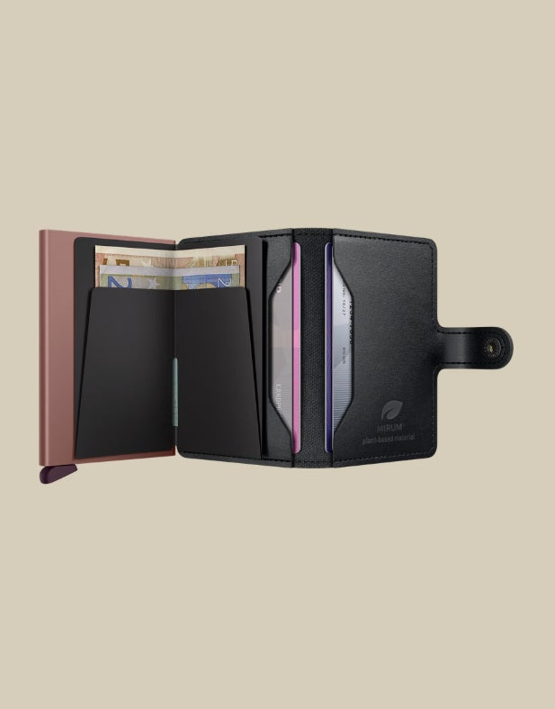 Secrid Miniwallet Porta Carte MIRUM, unisex leather card holder with plant-based material, compact design for credit cards and IDs.