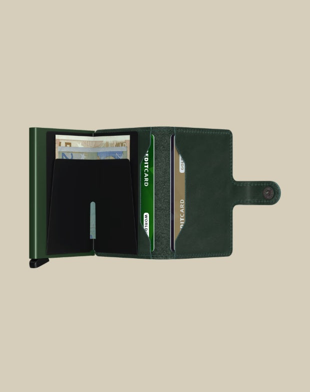 Secrid Miniwallet Original Porta Carte in black leather, unisex card holder with compact design and metal clip for credit cards.