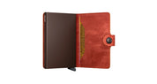 Vintage Secrid Miniwallet Porta carte unisex for cards and documents, compact leather accessory with minimalist design.