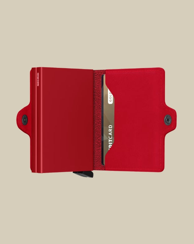 Secrid Twinwallet Original Secrid unisex card holder with compact design and metal exterior, holding credit cards and documents.