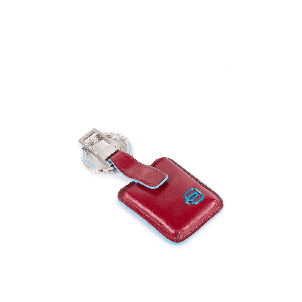 Blue Square Piquadro keychain with Connequ accessory, unisex accessory made of durable material, featuring the brand logo.