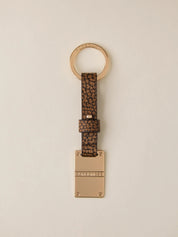 Borbonese keychain with metal piastrina design, stylish accessory for women featuring the brand's signature details.