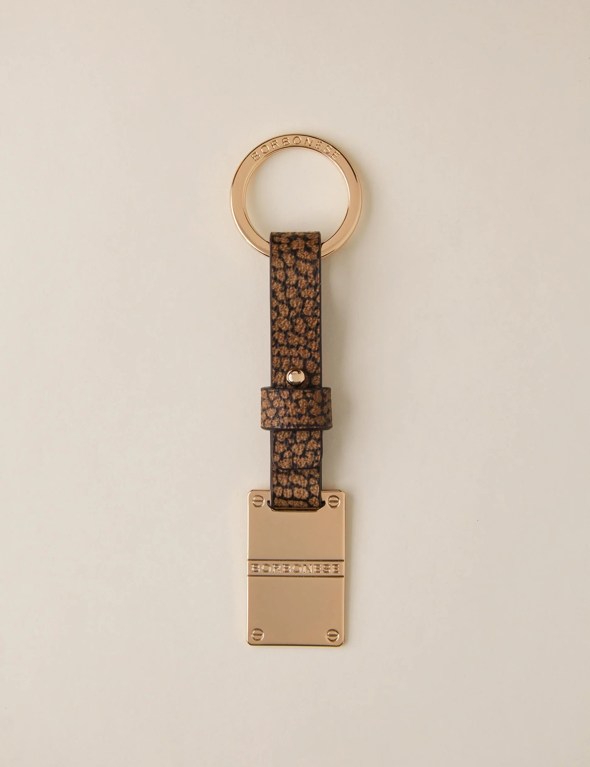 Borbonese keychain with metal piastrina design, stylish accessory for women featuring the brand's signature details.