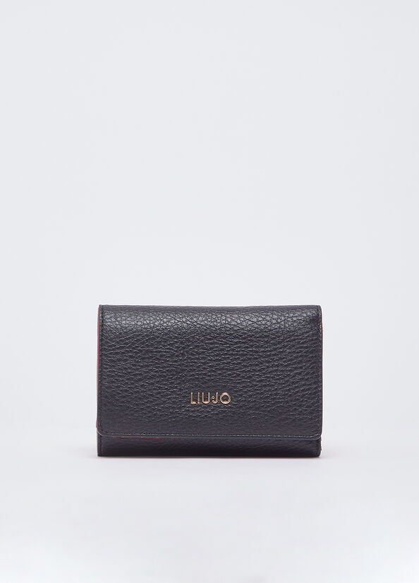 Liu Jo women's wallet showing pink leather exterior with multiple card slots and a compact design.