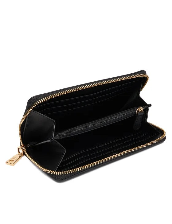 Love Moschino women's wallet, stylish accessory with bold design and branded logo, open to reveal multiple card slots and interior pockets.