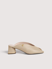 Coccinelle C-Everyday women's sandals with open toe design, beige leather straps, and ankle buckle detail.