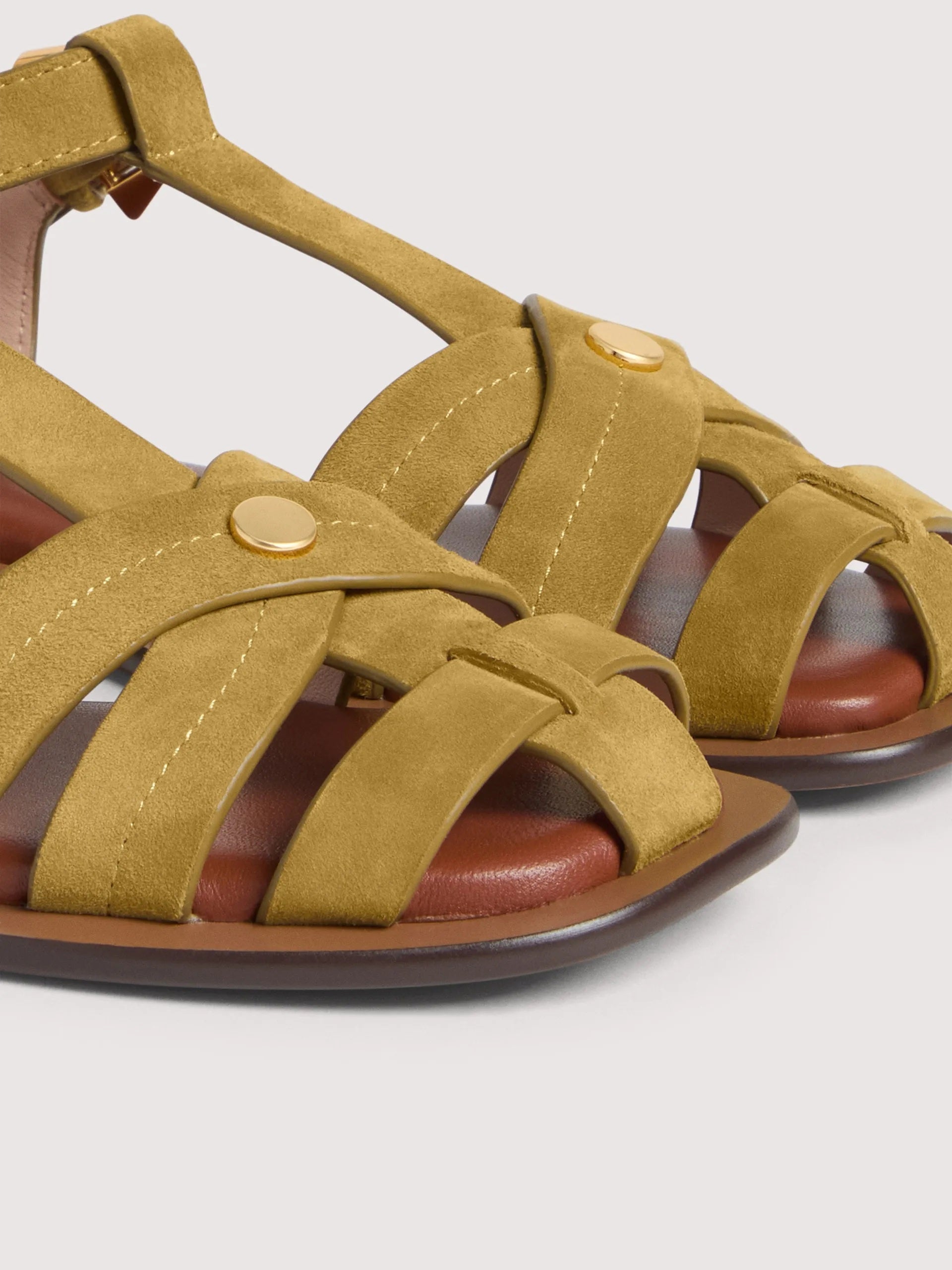 Coccinelle Sunup sandal for women featuring stylish straps and a comfortable flat sole, perfect for casual summer wear.