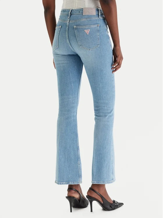 Guess Sexy Flare Donna jeans showing fitted waist, flared legs, and classic denim style on a model.