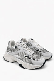 Silver Stardust Moschino sneakers for women, stylish casual footwear with a shiny metallic finish and comfortable design.