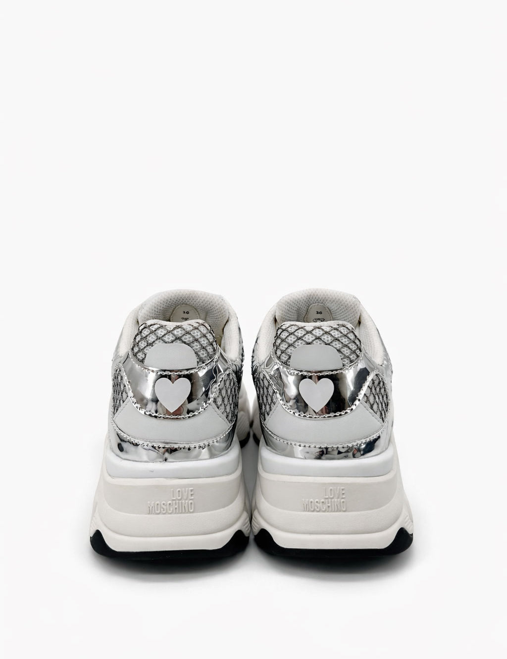 Silver Stardust Moschino sneakers for women with stylish design and reflective finish, casual footwear for trendy outfits.