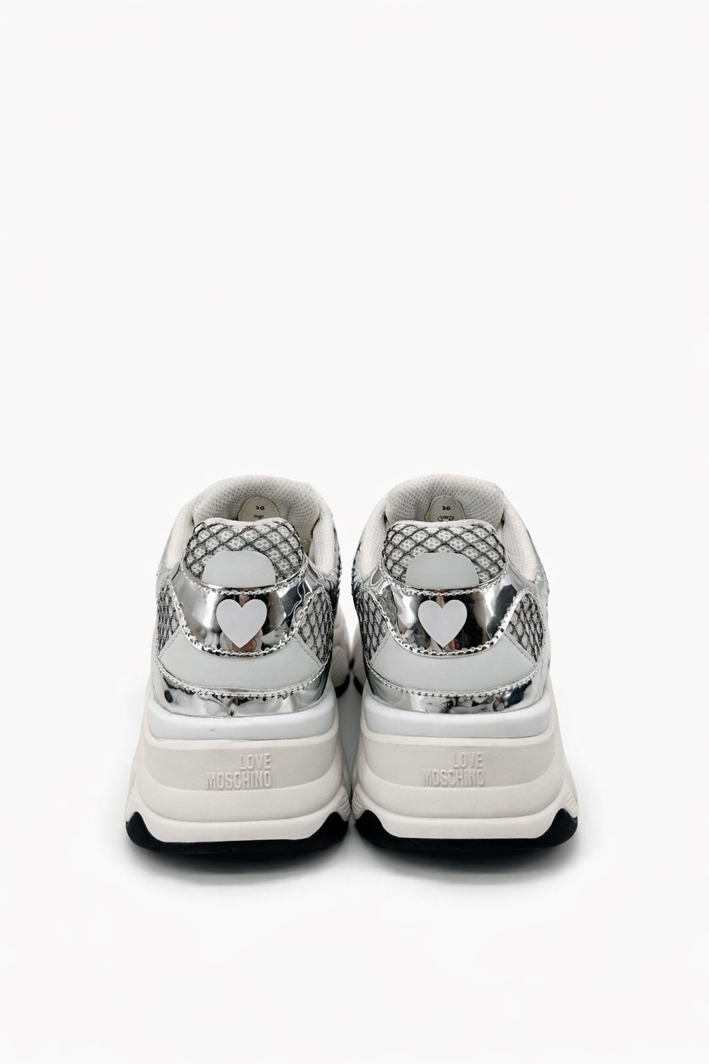 Silver Stardust Moschino sneakers for women with stylish design and reflective finish, casual footwear for trendy outfits.