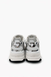 Silver Stardust Moschino sneakers for women with stylish design and reflective finish, casual footwear for trendy outfits.