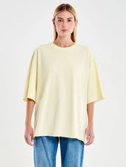 Oversized Vicolo Basic T-shirt for women in soft fabric, displayed on a hanger with a simple, classic design.