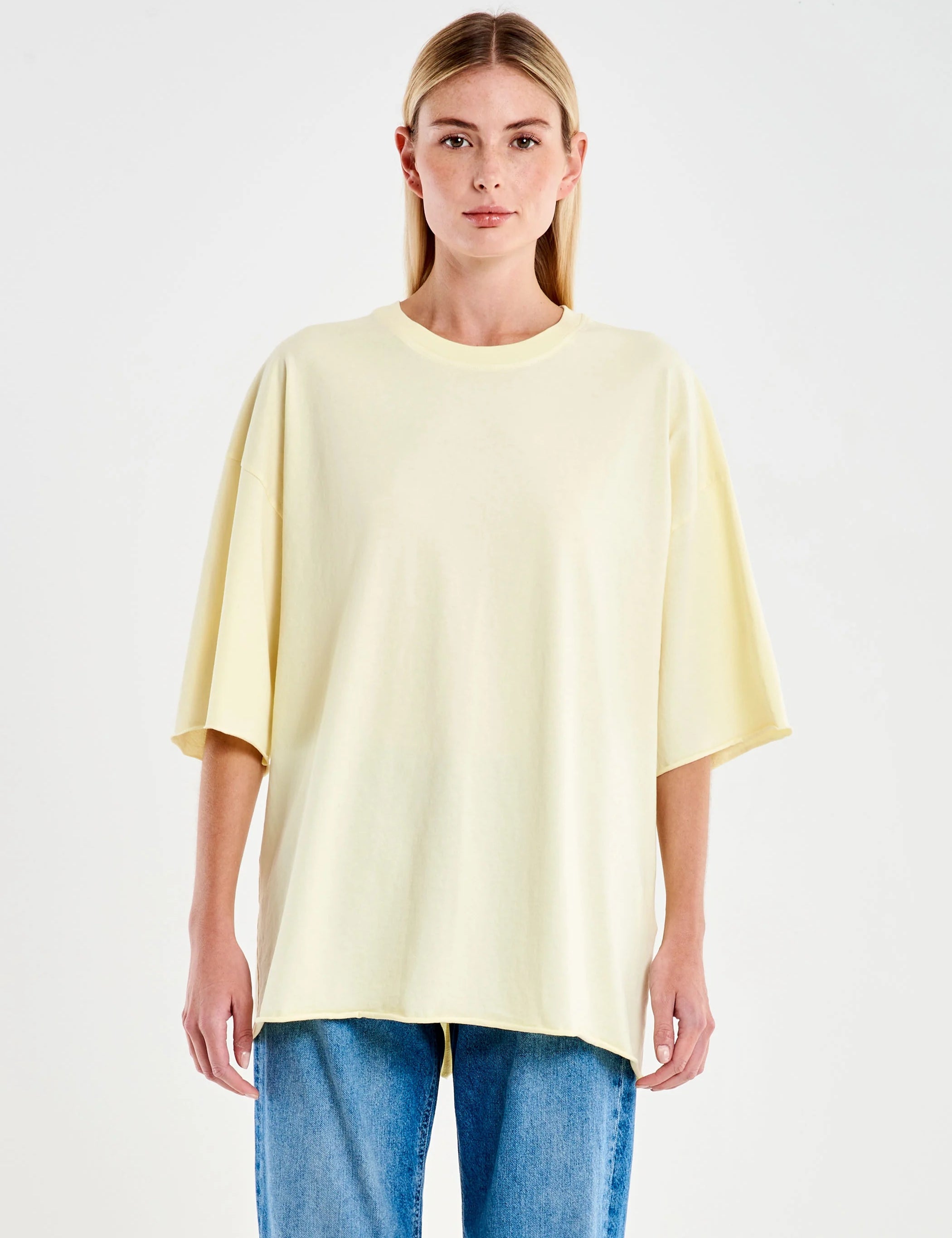 Oversized Vicolo Basic T-shirt for women in soft fabric, displayed on a hanger with a simple, classic design.