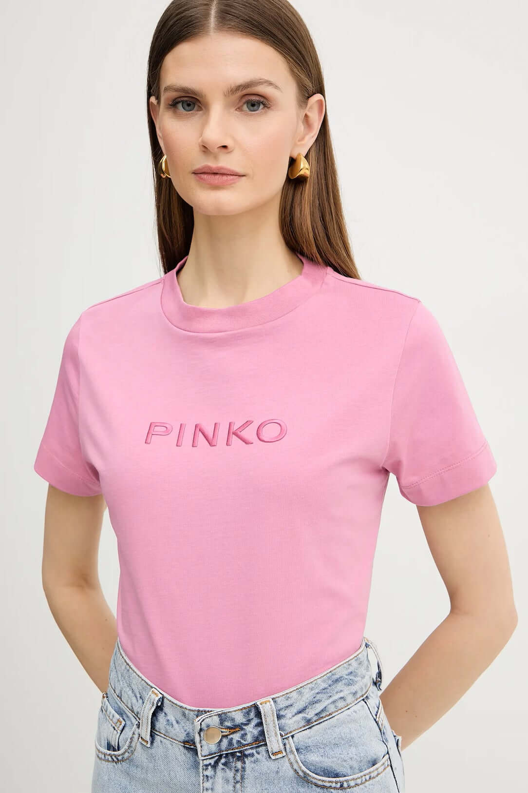 Pinko Donna T-shirt in pink with a casual fit, featuring a round neckline and short sleeves, displayed flat.