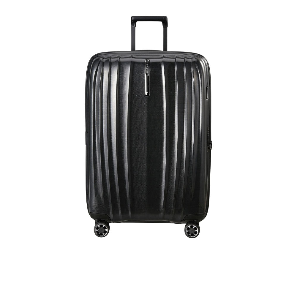 Large Samsonite Nexis Exp trolley suitcase for unisex travel, featuring durable wheels and spacious design.