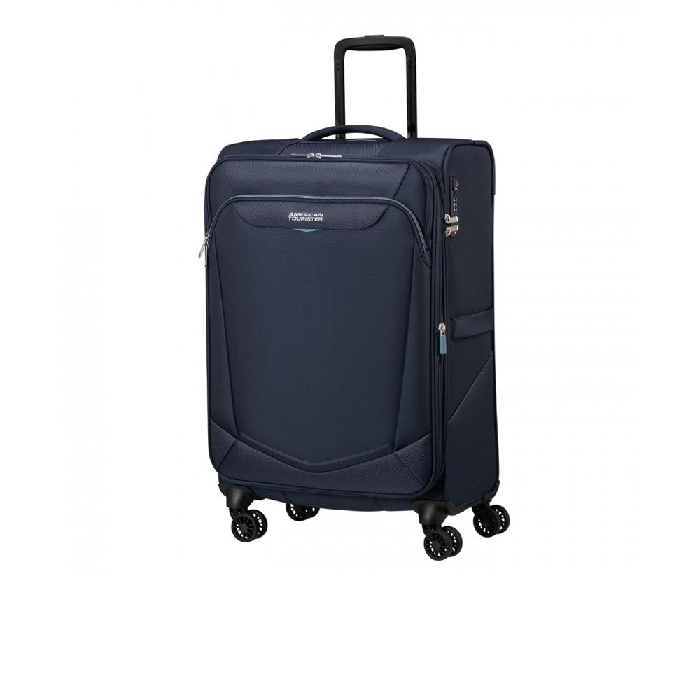 Large American Tourister SummerRide spinner trolley with expandable design, unisex travel luggage on four wheels.