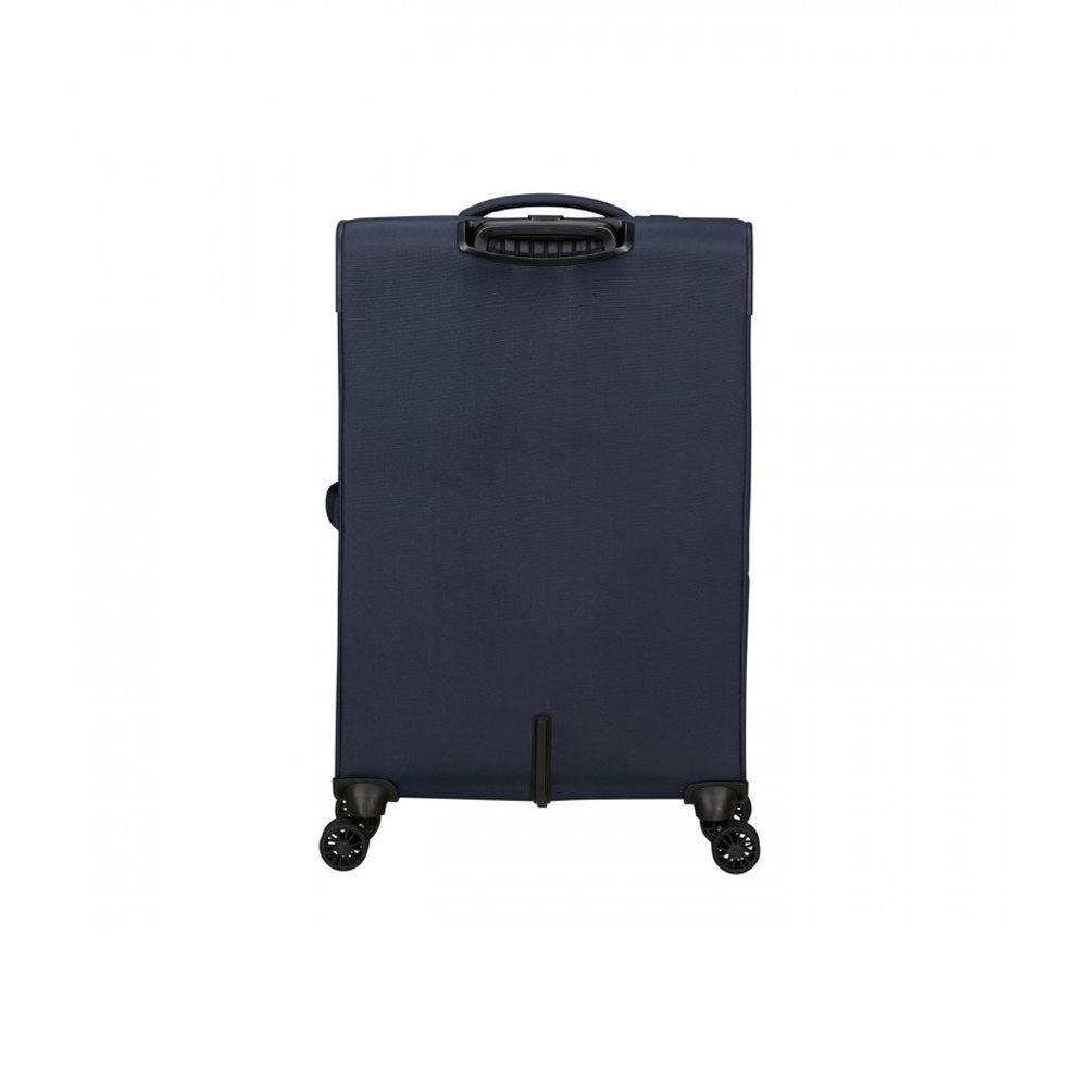 Large American Tourister SummerRide spinner trolley with expandable design, unisex travel accessory, wheels, and sturdy handle.