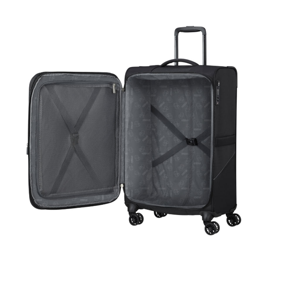 American Tourister Medio Summerride Spinner expandable trolley luggage with four wheels, unisex travel accessory in navy blue.