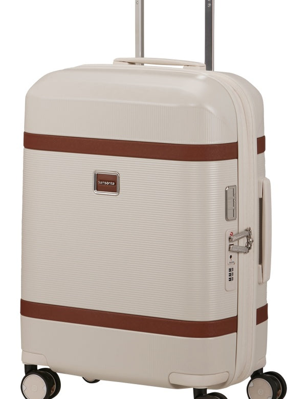 Unisex cabin trolley bag by Samsonite with hard shell design, compact size, and four wheels for easy travel.