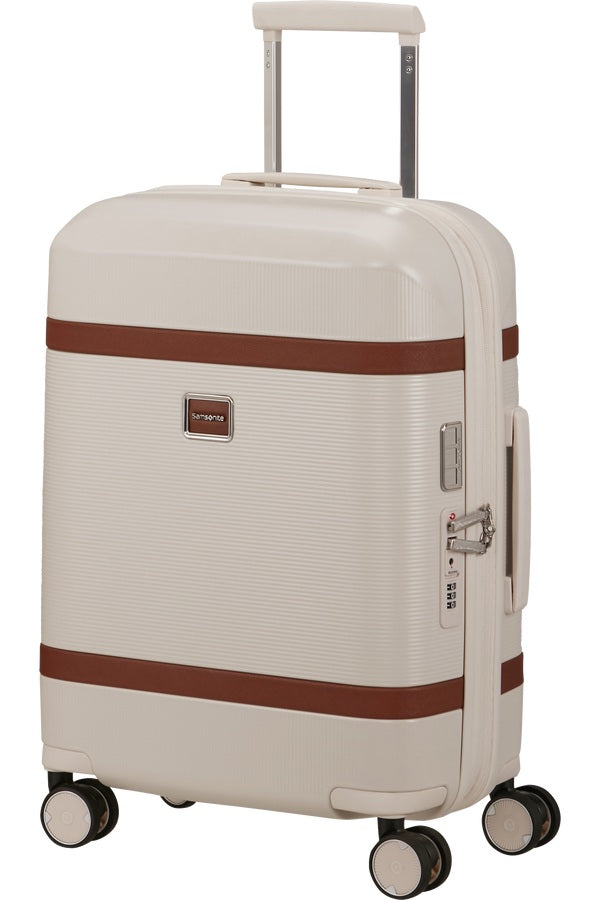 Unisex cabin trolley bag by Samsonite with hard shell design, compact size, and four wheels for easy travel.