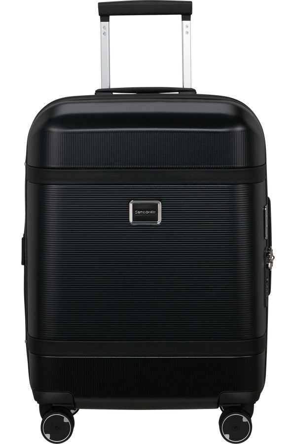 Unisex cabin trolley bag by Samsonite with hard-shell exterior and extendable handle, suitable for travel and hand luggage.
